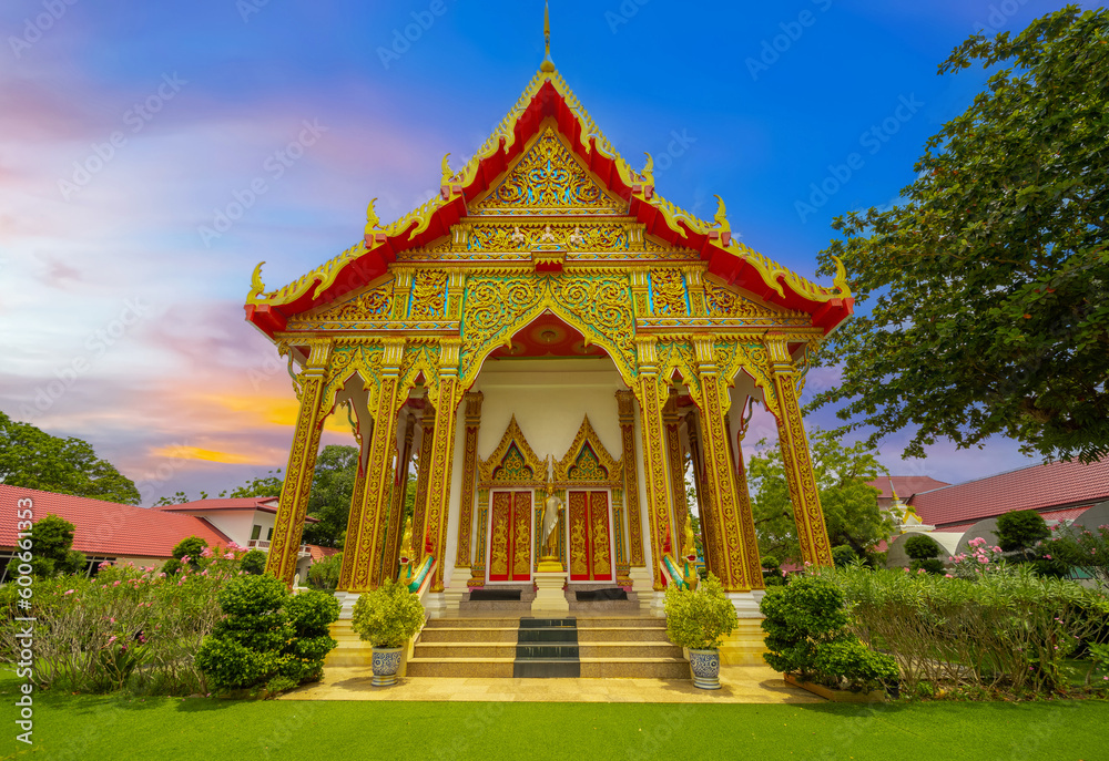 Beautiful Wat Buddhist temples in Phuket Thailand. light up at night and Decorated in beautiful ornate colours of red and Gold and Blue. Lovely sunset Beautiful Wat Buddhist temples in Phuket Thailand. light up at night and Decorated in beautiful ornate colours of red and Gold and Blue. Lovely sunset