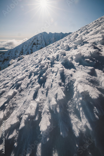 Sastrugi snow formations in winter on Katahdin, Maine photo