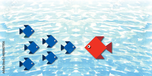 Photography Group of small fish with one big red fish in the sea blue background