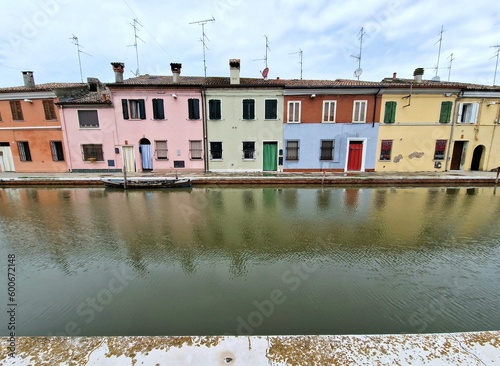 View of Comacchio, Italy, on the Adriatic coast, famous for bridge (tourism) and for its eel fishing - antennas on roofs