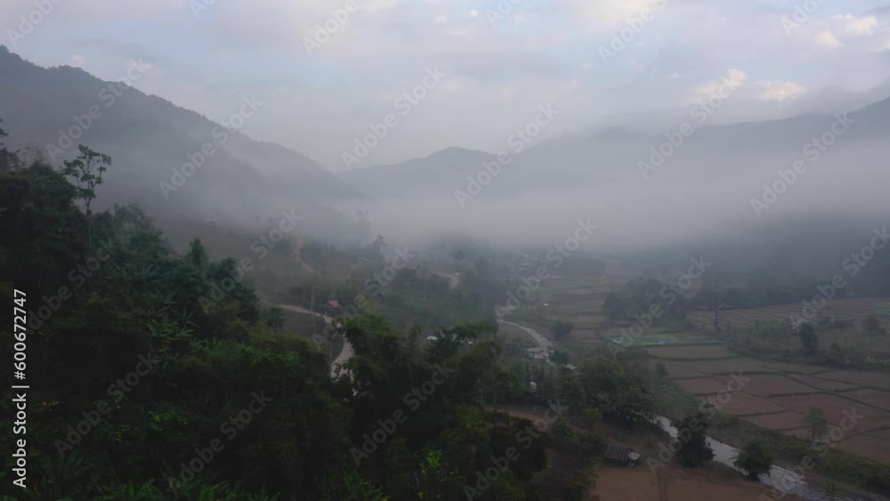 Aerial Drone Shot Of Magnificent Mountains Landscape In Sapan In Foggy Weather, Thailand Aerial Drone Shot Of Magnificent Mountains Landscape In Sapan In Foggy Weather, Thailand