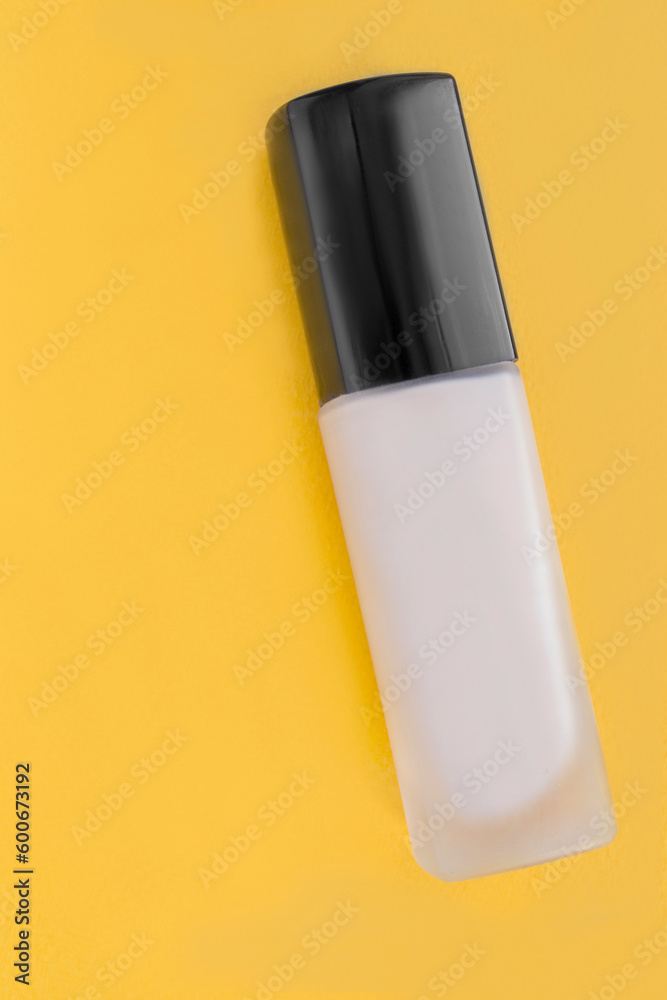 Foundation cream on yellow Foundation cream on yellow