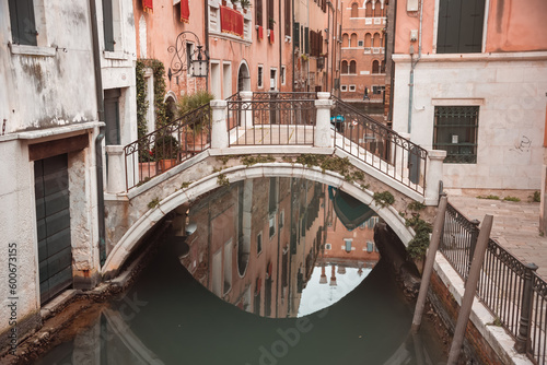 Fotobehang Narrow canal with gondolas in Venice, Italy