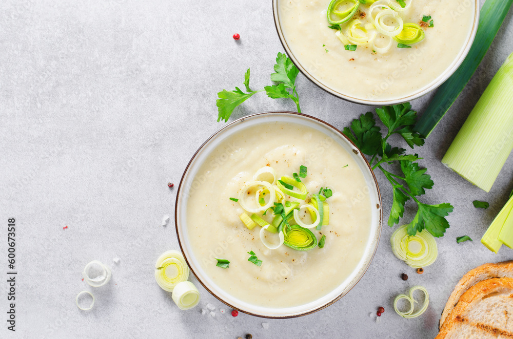 Leek Soup, Comfort Meal, Potato and Leek Creamy Soup, Vegetarian Food on Bright Background Leek Soup, Comfort Meal, Potato and Leek Creamy Soup, Vegetarian Food on Bright Background