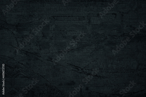 Black dirty stone wall texture. Dark rough masonry wallpaper. Night gloomy grunge abstract background