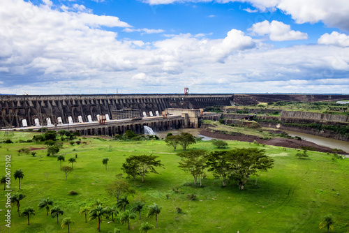 Itaipu Binacional hydroelectric power station in Foz do Iguazu Brazil, border Paraguay. Panoramic aerial view of giant dam on Parana river, South America. Hydro electrification concept. Copy ad space photo