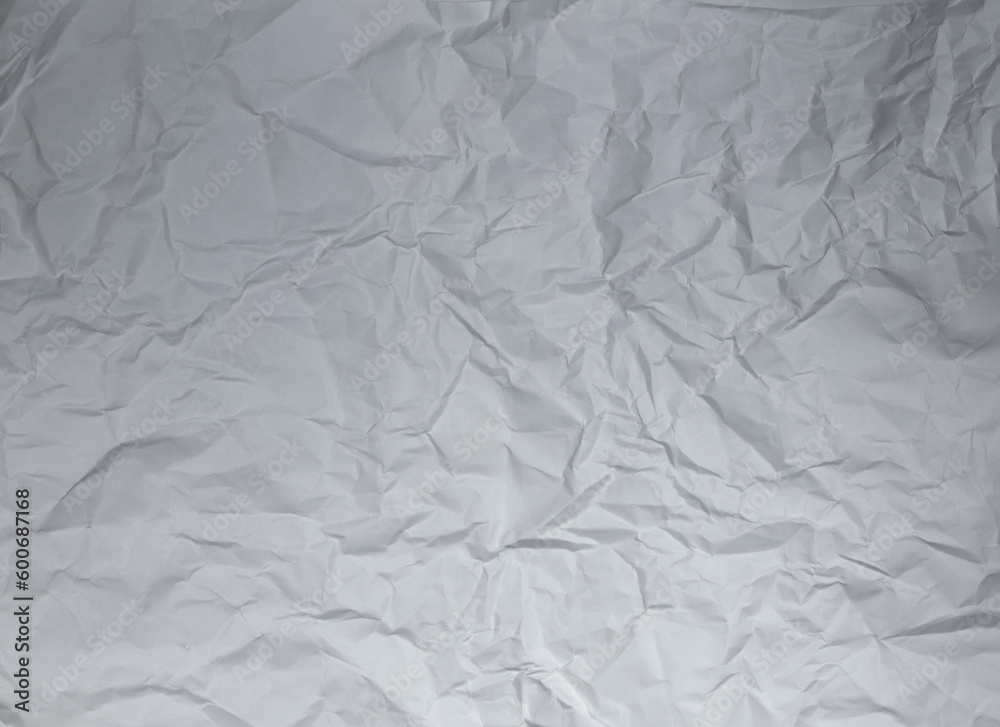 Naklejka premium Wrinkled and Crumpled Paper Textured Background