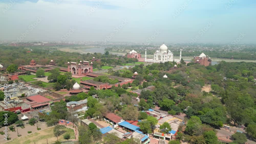 Taj Mahal, India: Aerial view of of iconic monument in city Agra (Uttar Pradesh), famous marble mausoleum on right bank of river Yamuna - landscape panorama of South Asia from above Taj Mahal, India: Aerial view of of iconic monument in city Agra (Uttar Pradesh), famous marble mausoleum on right bank of river Yamuna - landscape panorama of South Asia from above