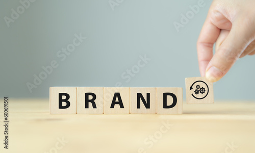 Rebranding strategy concept. Marketing and brand management. Rethinks marketing strategy with a new name, logo, or design, the intention of developing a new. Refreshing the look and feel of brand. photo