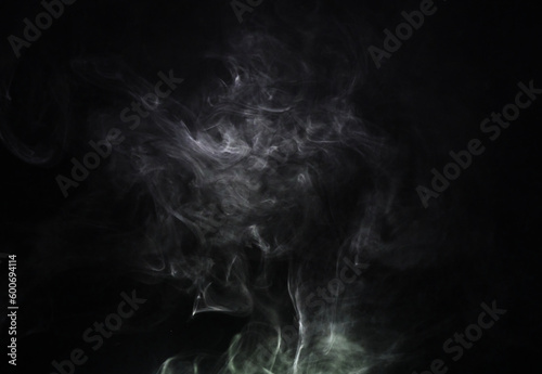 Grey smoke puff, white background and studio with no people with fog in the air. Smoking, smog swirl and isolated with smoker art from cigarette or pollution with graphic space for incense creativity photo
