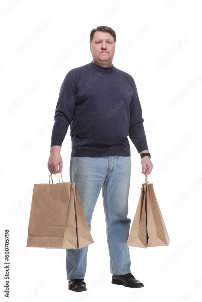 Mature man in jeans striding forward.isolated on a white background. Mature man in jeans striding forward.isolated on a white background.