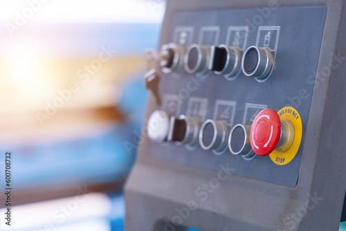 Wallpaper Mural Emergency botton on machine dashboard in factory or industrial plant. Occupational and safety concept. Torontodigital.ca