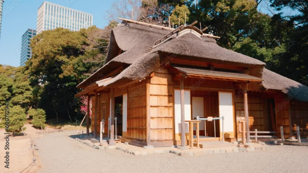 Traditional Japanese house at Hamarikyu Gardens, which is a natural park area in Shiodome District in Tokyo, Japan Traditional Japanese house at Hamarikyu Gardens, which is a natural park area in Shiodome District in Tokyo, Japan