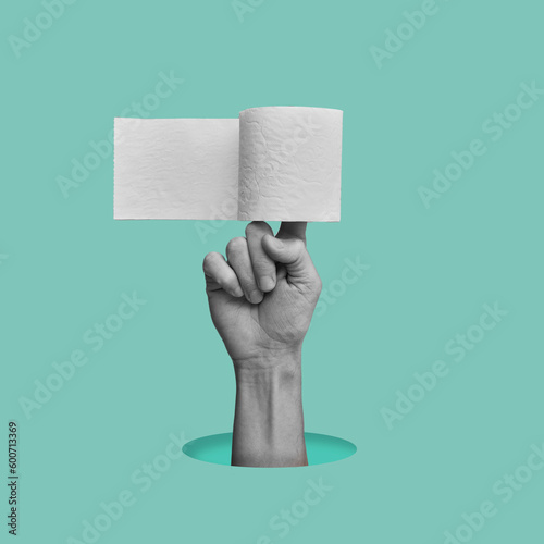 hand with a toilet paper roll photo