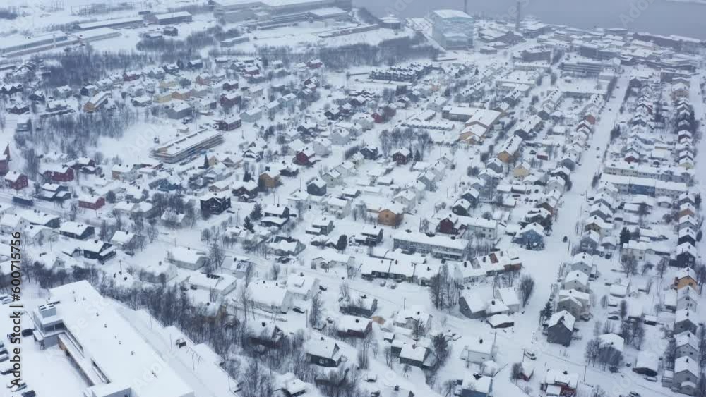 Aerial Drone View of Kirkenes Town in Norway. Flying over Snowy Norwegian Town in Wintertime. Aerial Drone View of Kirkenes Town in Norway. Flying over Snowy Norwegian Town in Wintertime.