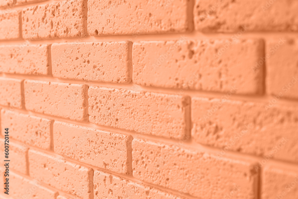 Background of brick wall orange colour, structural decorative plaster brick. Front view Background of brick wall orange colour, structural decorative plaster brick. Front view