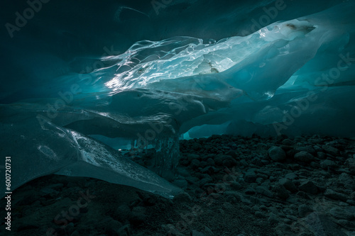 magical blue ice structures in a glacier cave in the Swiss Alps