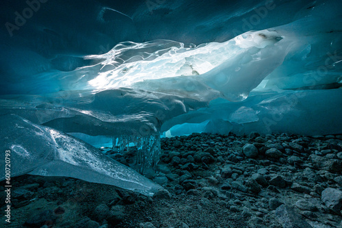 magical blue ice structures in a glacier cave in the Swiss Alps