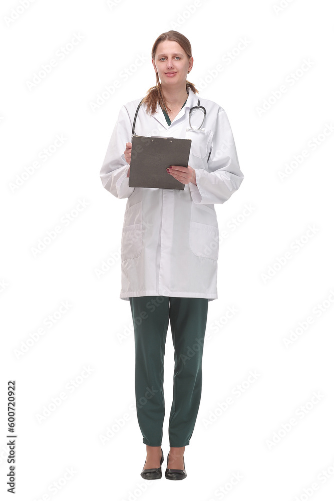 Happy smiling female doctor with stethoscope writing on clipboard Happy smiling female doctor with stethoscope writing on clipboard