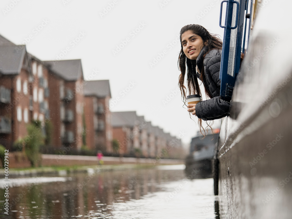 Young woman looking from a boat