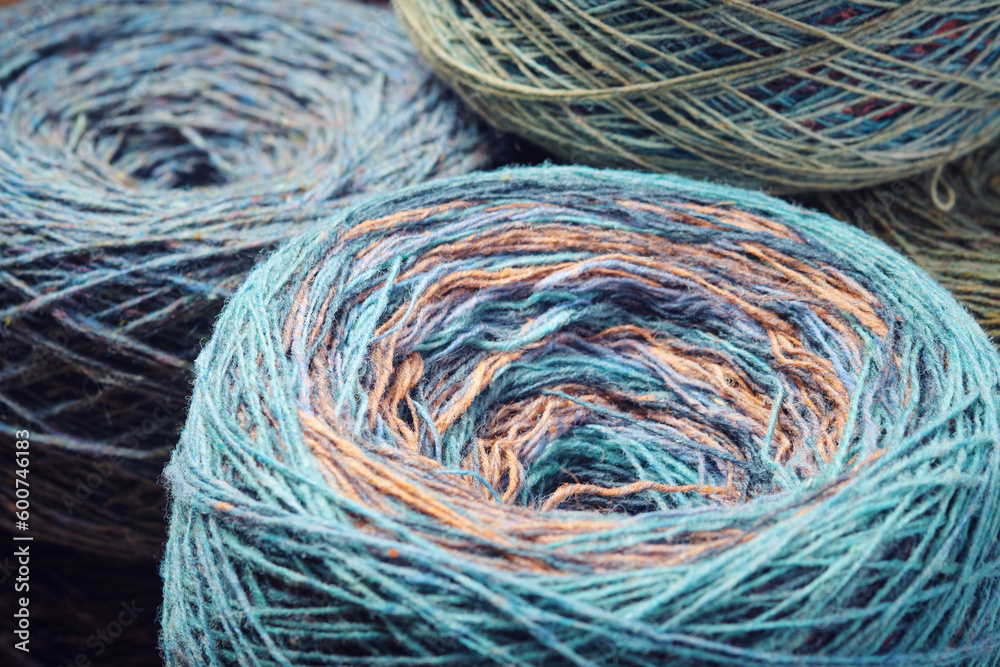 Round skeins of organic multi-coloured lambswool yarn. Round skeins of organic multi-coloured lambswool yarn.