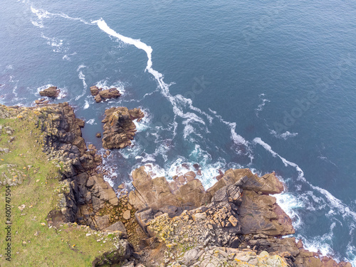 between landsend and sennen coastline with mist cornwall england uk from the air drone  photo