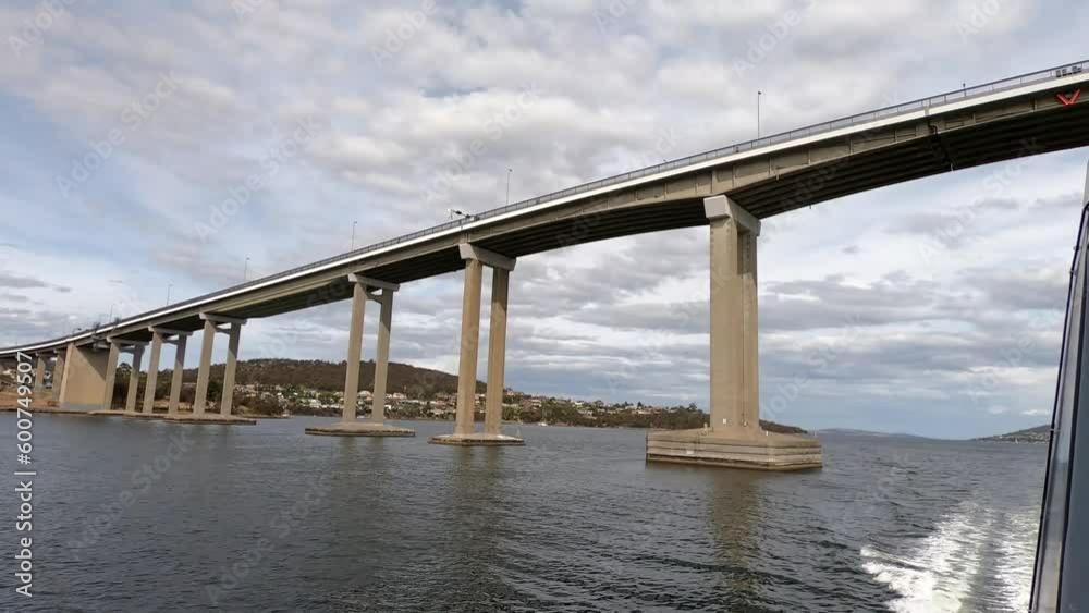 Passing under the Tasman Bridge with the city of Hobart in the background Passing under the Tasman Bridge with the city of Hobart in the background