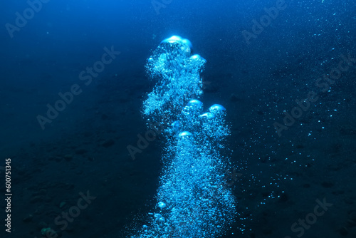 air bubbles underwater background diving in the sea