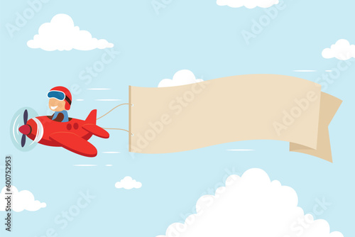 Foto Cute pilot flying on vintage red airplane with banner