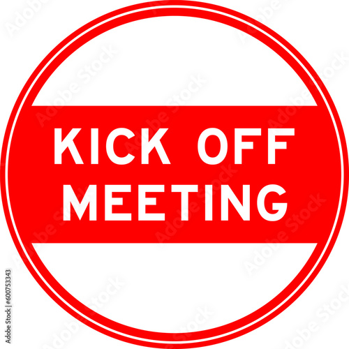Red color round seal sticker in word kick off meeting on white background