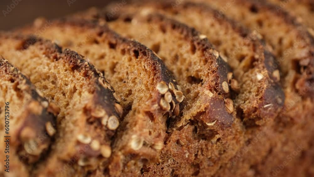 Sliced rye bread with flax seeds, slider shot Sliced rye bread with flax seeds, slider shot