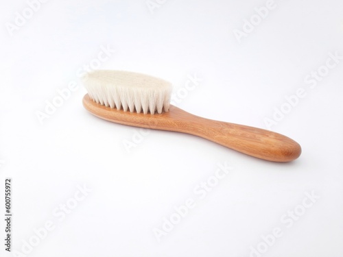 Hair brush isolated on white background. Baby hair brush that is soft and safe to use on baby s head