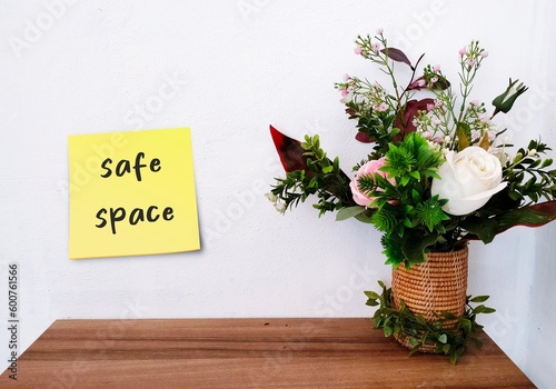 фотографія Welcome wall with handwritten text SAFE SPACE, places where people can feel conf