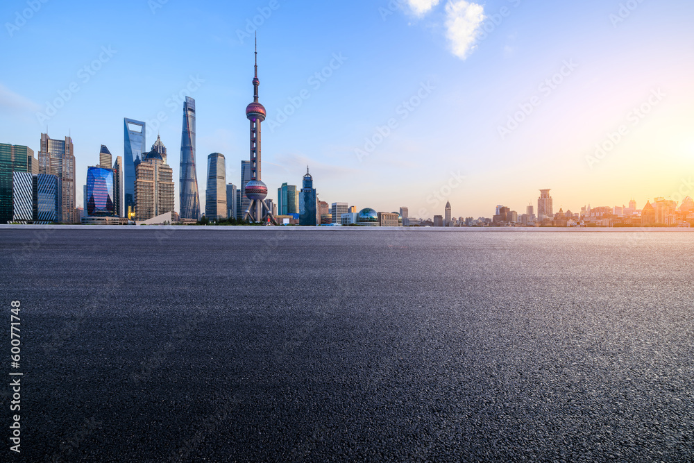 Fototapeta premium Asphalt road and city skyline with modern buildings in Shanghai, China.