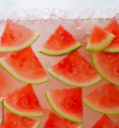 Cold water flavored with watermelon slices