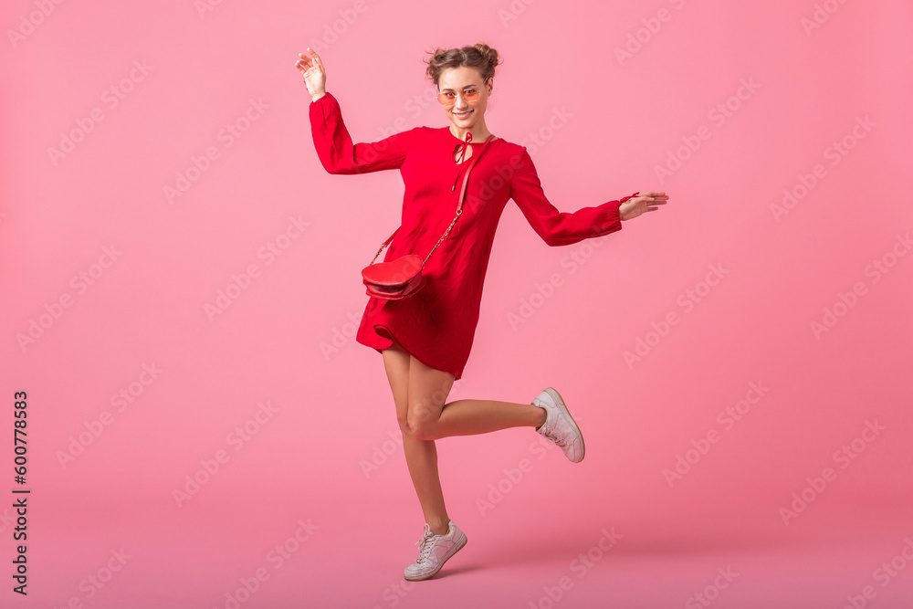 attractive happy smiling stylish woman in red trendy dress