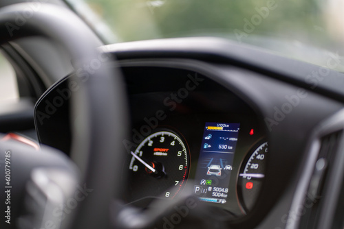 Closeup modern, dark car interior, digital screen with helpful information