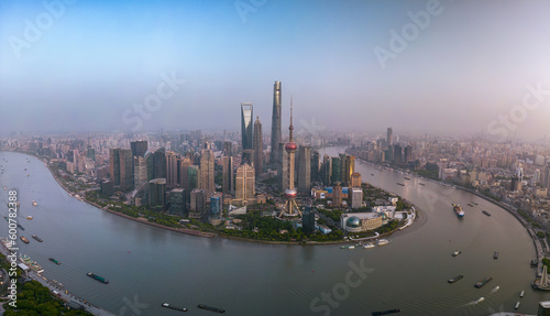 The drone aerial view of Lujiazui financial and trade zone at dusk, Pudong, Shanghai, China. Lujiazui is the largest financial zone in mainland China. © yujie