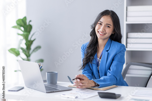 Businessman working at office with documents on his desk, doing planning analyzing the financial report, business plan investment, finance analysis concept