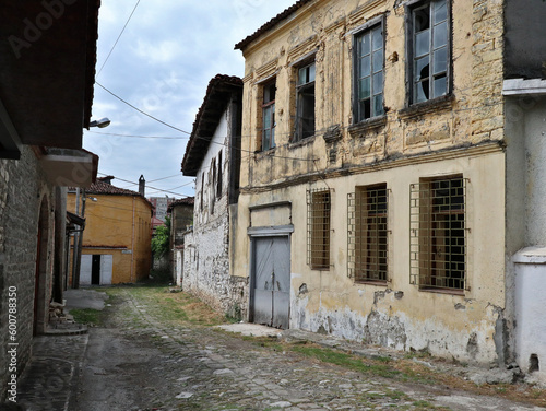 old abandoned building with broken windows in a small street in europe (old, historic) albania elbasan © Yuriy T