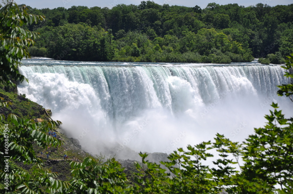 Fototapeta premium Roaring waterfall on a sunny summer day