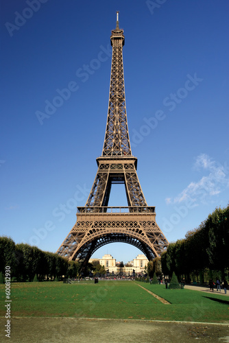 The incredible Eiffel Tower in Paris on a warm summer day.