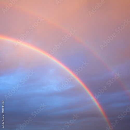Nature s Beauty  A Double Rainbow in the Thunderous Sky