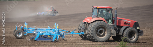 Tilling the soil  a tractor cultivator in action