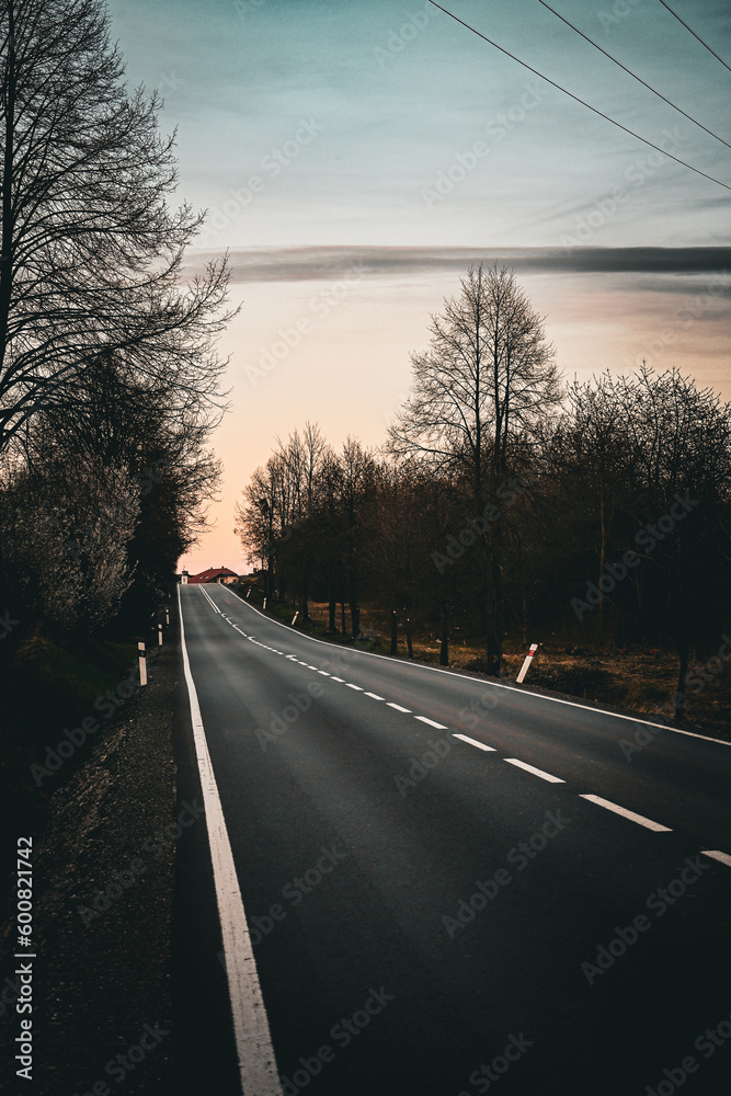 driving on the highway at sunset