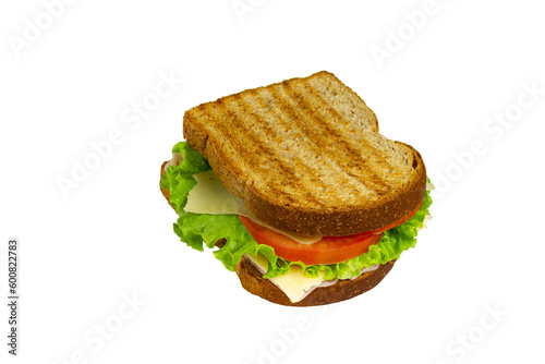 Sandwich with Ham, cheese, lettuce, and tomatoes inside of a loaf bread