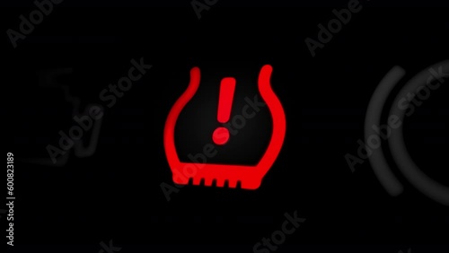 Low Tire Pressure Warning Light on Car Dashboard

