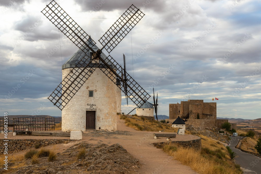 Windmills of Consuegra at Sunrise , Castilla-La Mancha, Spain. Beautiful exposure of the Windmills of Consuegra at Sunrise located on Castilla-La Mancha, Spain. Windmills of Consuegra at Sunrise , Castilla-La Mancha, Spain. Beautiful exposure of the Windmills of Consuegra at Sunrise located on Castilla-La Mancha, Spain.
