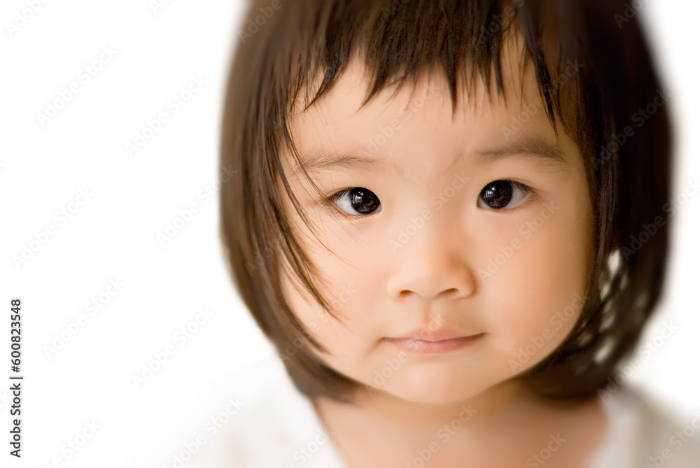 She is a beautiful Asian baby with innocent face. She is a beautiful Asian baby with innocent face.