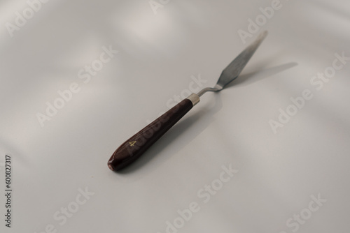 pastry spatula palette knife cooking utensils for cakes on the table on a white background close-up